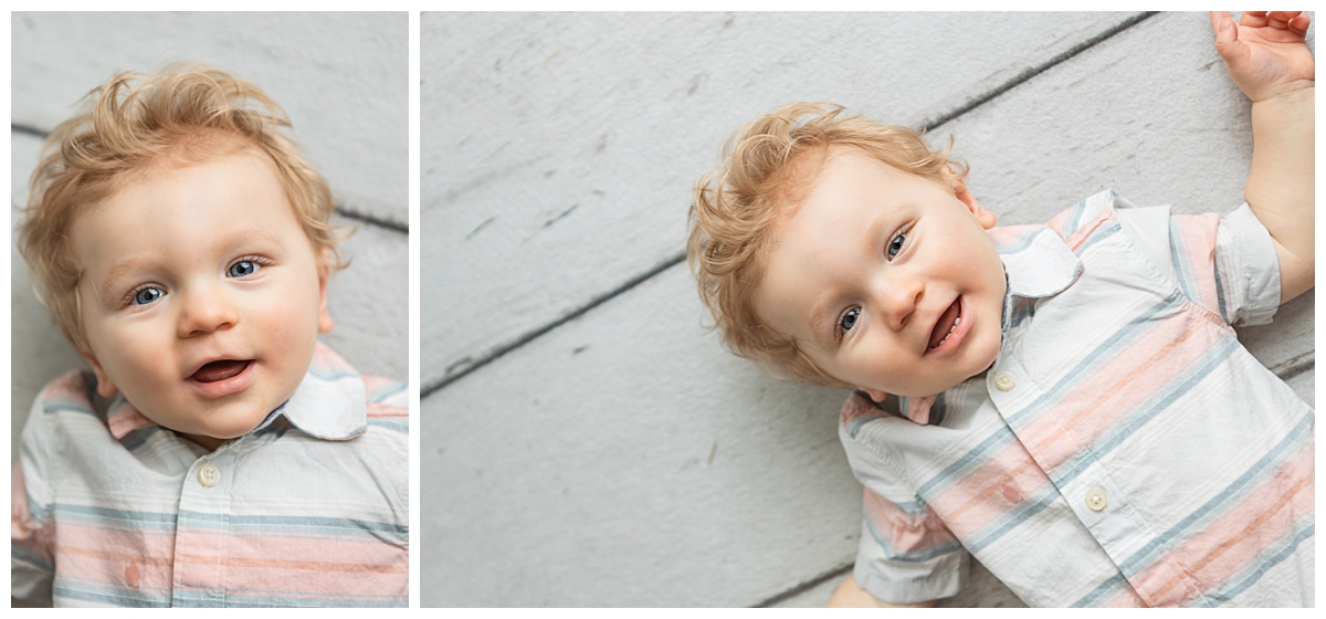 Little boy smiling for his six month milestone session at Jennifer Brandes Photography.