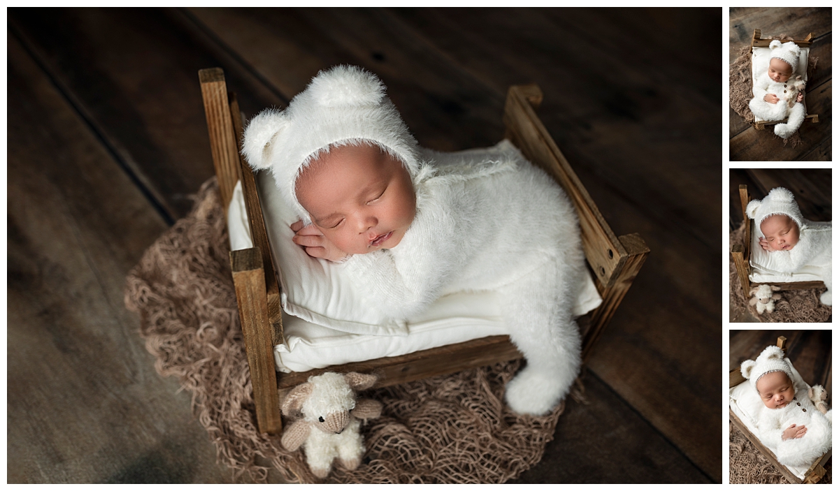 Little boy wearing a white bear outfit and bonnet during his newborn session.