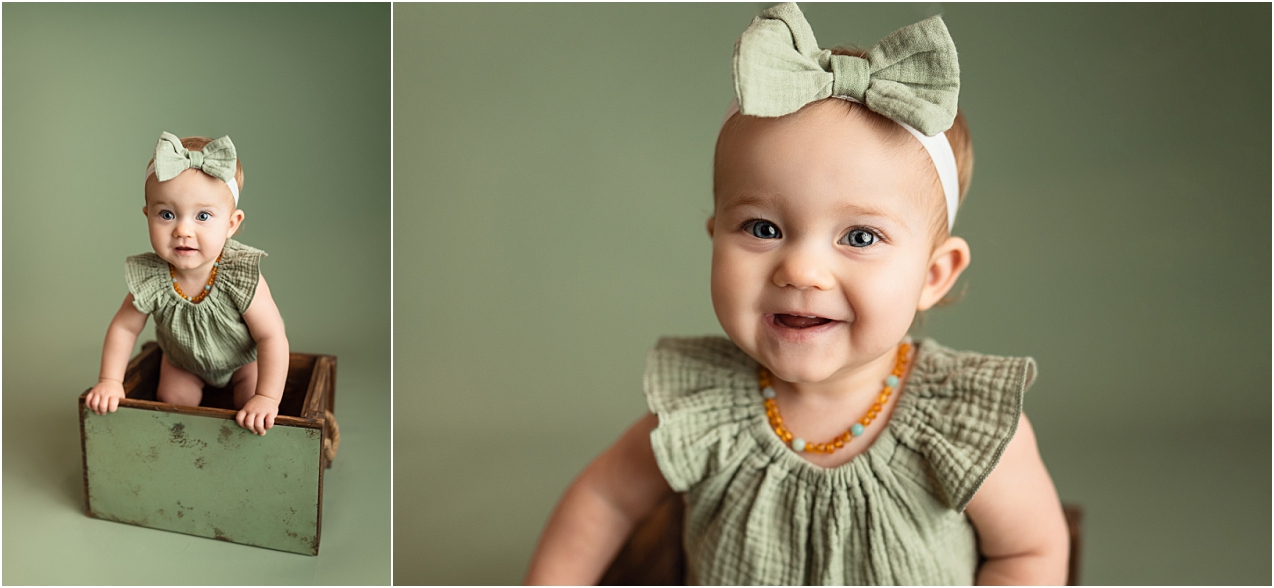 9 month old baby girl in a green romper for her milestone photo session. 