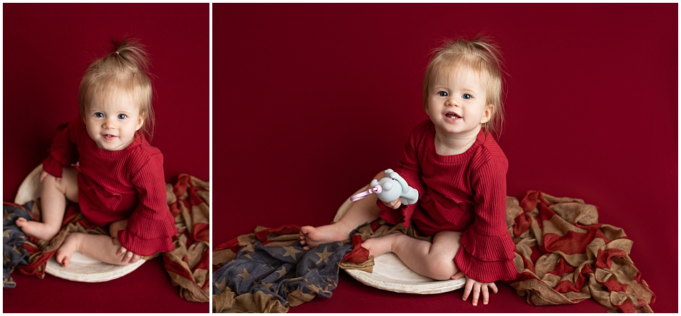 Sitter milestone session for baby girl on red.